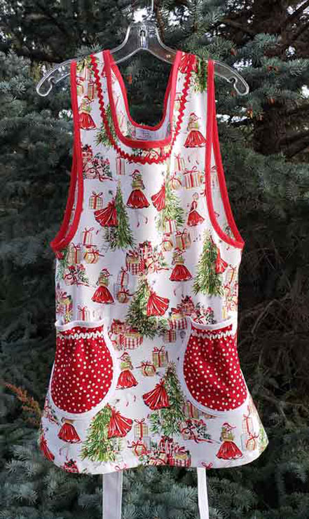 Trimming the tree in Grandma apron