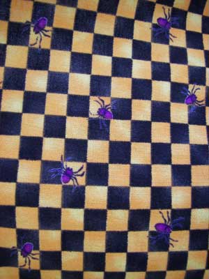 Black and yellow gingham with purple spiders